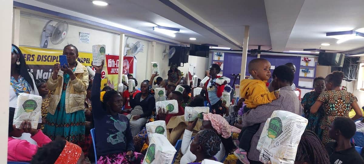 Members of Believers Discipleship Chapel at a Neema Operations food distribution in Tassia